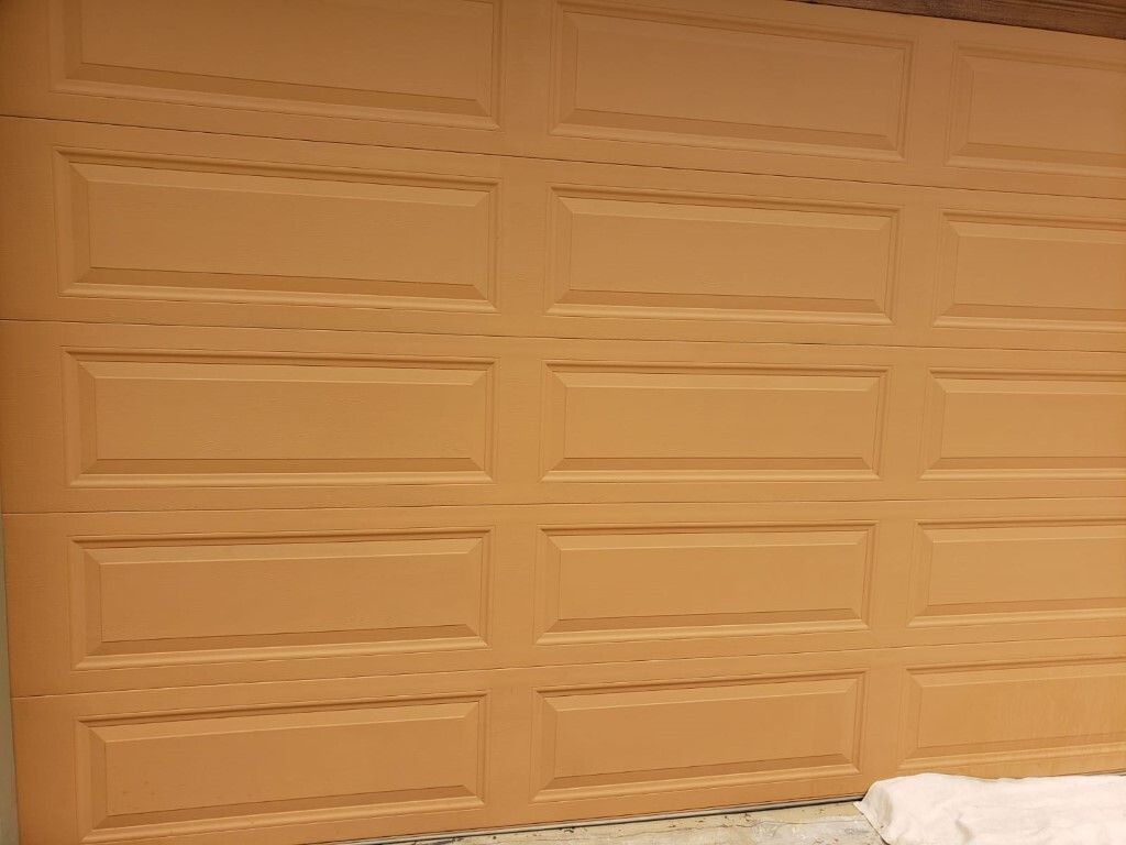 Garage door during faux wood finish